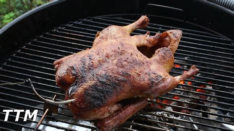 how-to-bbq-a-whole-duck-on-the-weber-kettle-grill image