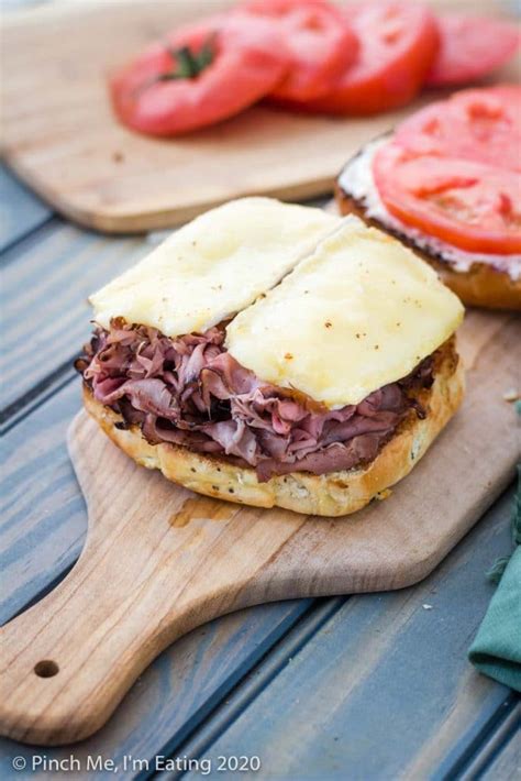 hot-roast-beef-sandwich-with-brie-and-tomato-pinch image