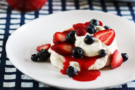 recipe-mini-summer-berry-pavlovas-with-strawberry-sauce image
