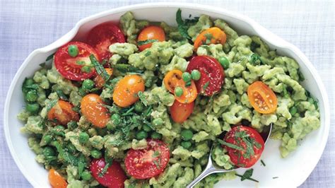 pea-spaetzle-with-mint-chives-and-tomatoes image