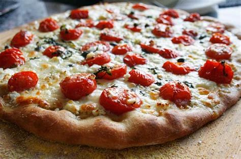 pizza-with-cherry-tomatoes-goat-cheese-italian image