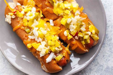 cheesy-baked-hot-dogs-recipe-simply image