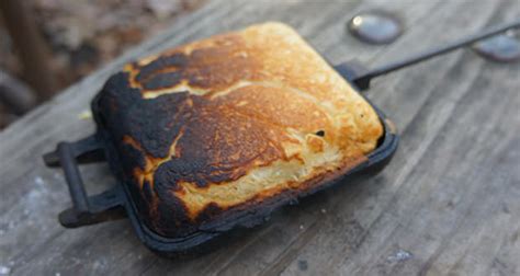 pie-iron-breakfast-ham-omelet-50-campfires image