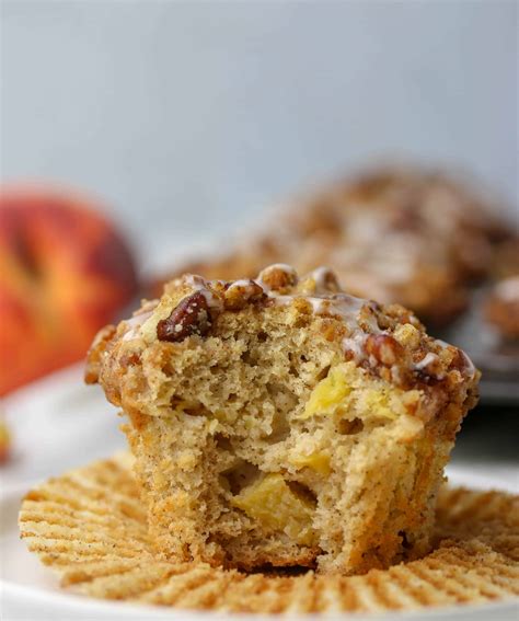 peach-muffins-with-a-pecan-streusel-topping image