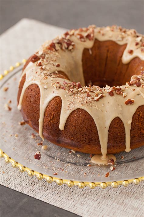 pumpkin-bundt-cake-with-brown-sugar-glaze-pecans image