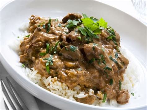 crock-pot-beef-tips-gravy-with-rice image