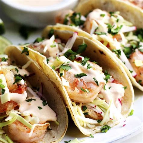 easy-shrimp-tacos-crunchy-slaw-creamy-sauce image
