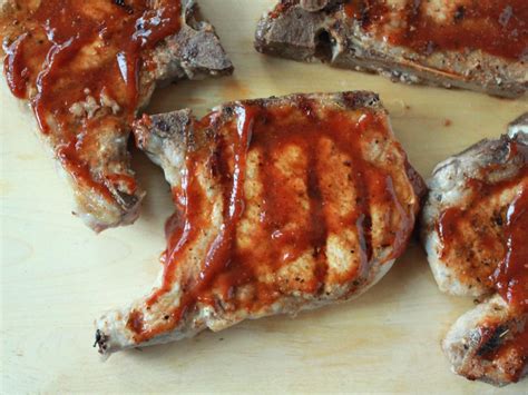 spice-rubbed-pork-chops-with-sorghum-bbq-sauce image