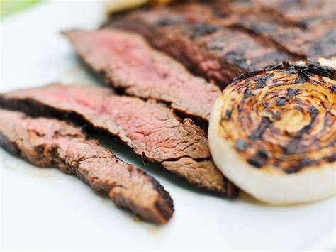mojo-marinated-flank-steak-with-grilled-onions-recipe-serious image