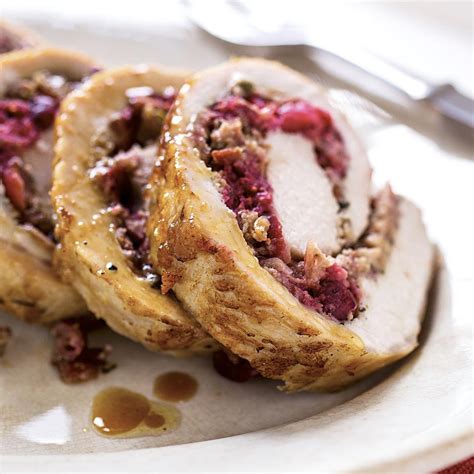 cranberry-rosemary-stuffed-pork-loin-eatingwell image