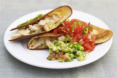 easy-cheesy-chicken-quesadillas-recipe-the-spruce image