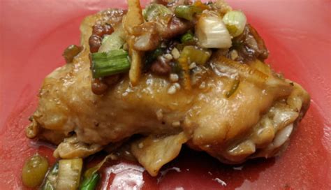 orange-chicken-with-green-onions-and-walnuts image