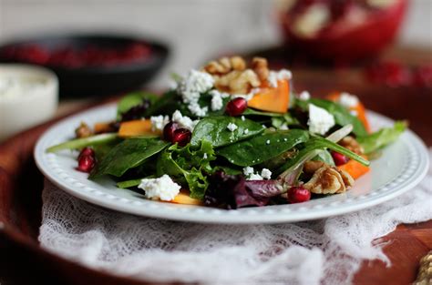 pomegranate-persimmon-goat-cheese-salad image