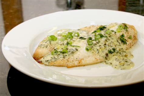 baked-tilapia-with-cilantro-lime-cream-sauce image