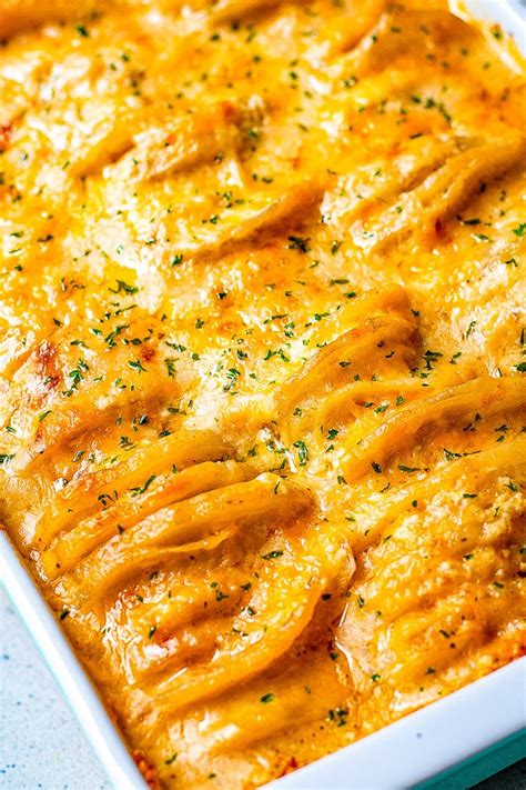 baked-scalloped-potatoes-with-cheese-3-kinds-averie image