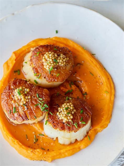 seared-scallops-over-roasted-butternut-squash-puree image