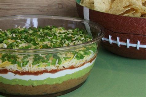 party-appetizer-six-layer-taco-guacamole-dip-the image