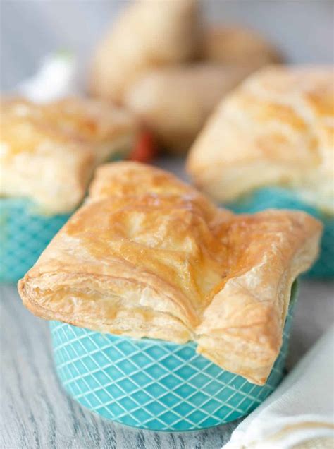 mini-chicken-pot-pies-with-puff-pastry-mama-needs-cake image