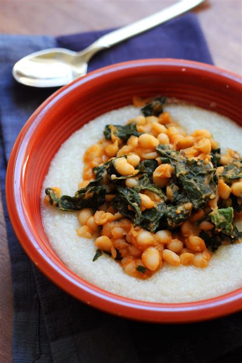 cajun-white-beans-and-kale-over-creamy-grits image