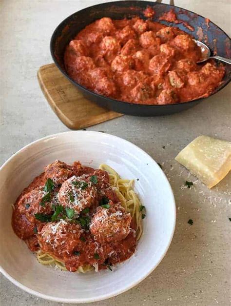 italian-style-pork-meatballs-with-creamy-tomato-sauce image