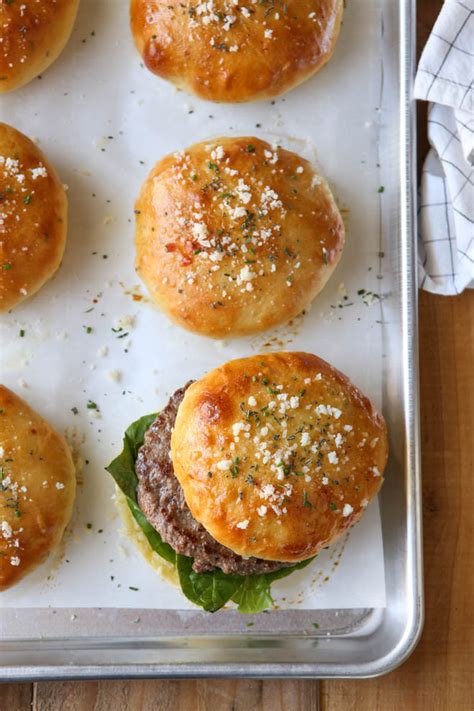 cheesy-herb-burger-buns-completely-delicious image