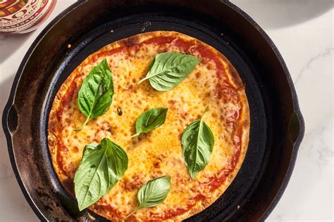 cast-iron-tortilla-pizza-recipe-the-kitchn image