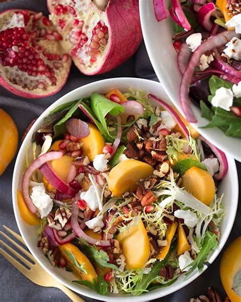 persimmon-pomegranate-and-goat-cheese-salad image