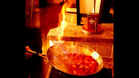 how-to-flambe-at-home-flambed-strawberries image