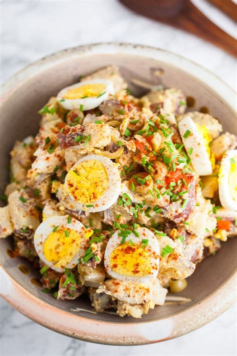 spanish-style-potato-salad-with-olives-the-rustic image