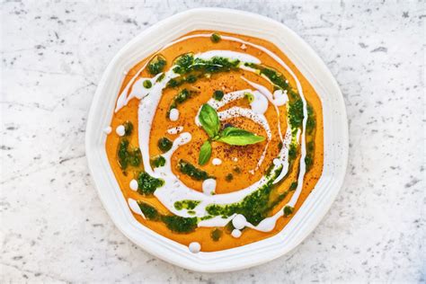 tomato-soup-with-a-whole-head-of-garlic-food52 image