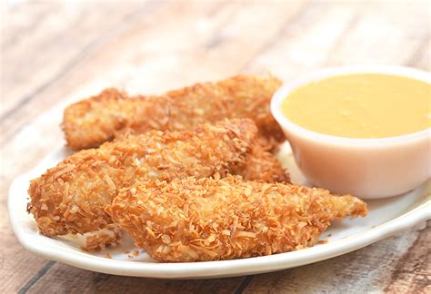 coconut-chicken-tenders-with-spicy-mango-sauce image