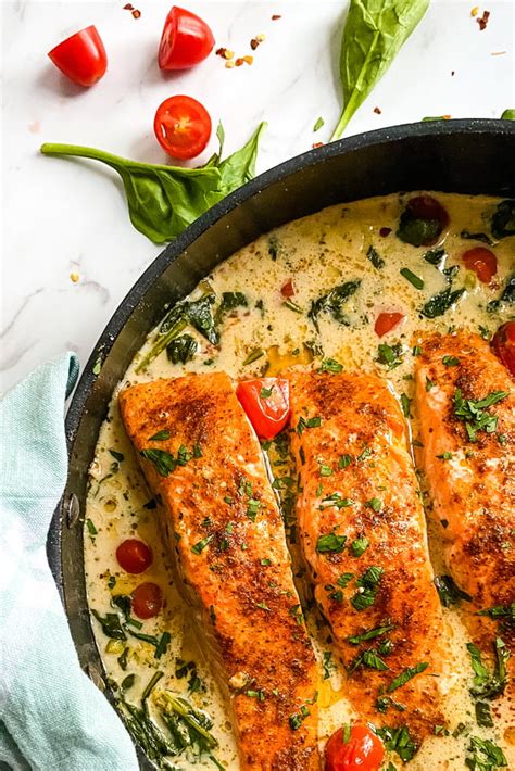 baked-salmon-with-creamy-coconut-spinach-sauce image