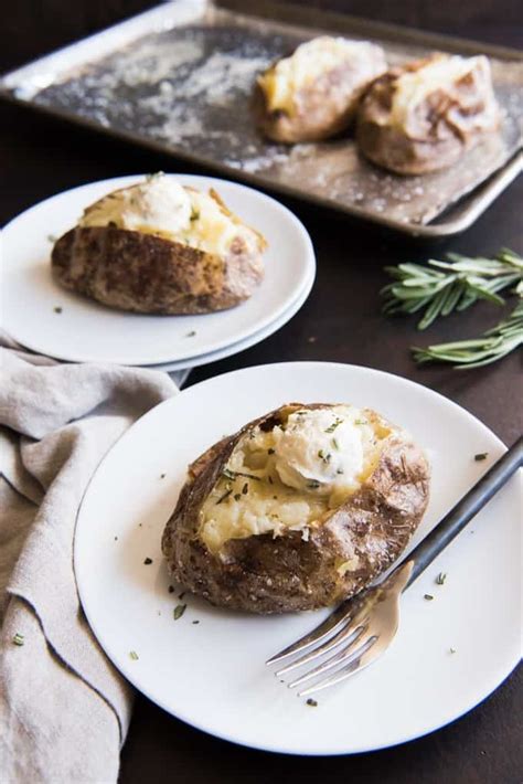salt-crusted-baked-potatoes-with-roasted-garlic image