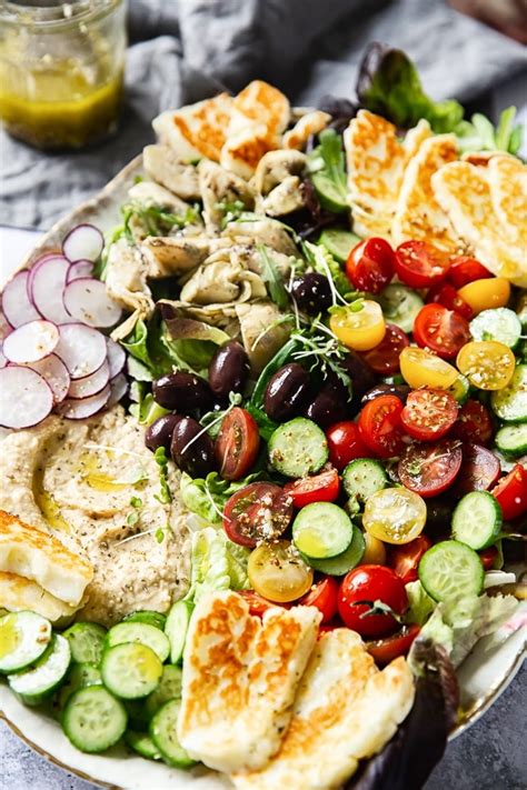 mediterranean-salad-with-hummus-and-fried-halloumi image
