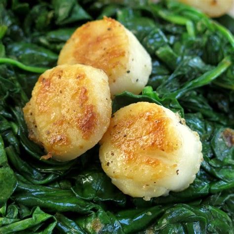 pan-seared-scallops-recipe-with-wilted-spinach-the image