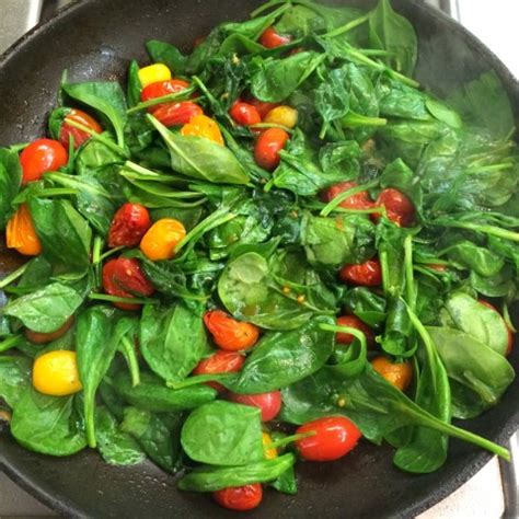 spinach-and-cherry-tomato-saute-shockingly-delicious image