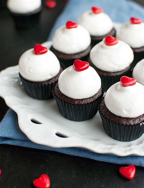 mini-chocolate-cupcakes-with-meringue-raspberry image
