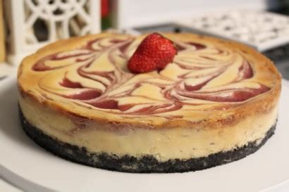 white-chocolate-strawberry-swirl-cheesecake-tasty image