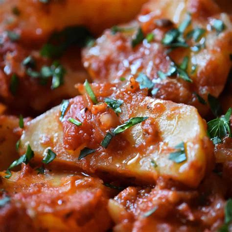 italian-potato-recipe-with-tomatoes-and-onions-she-loves-biscotti image