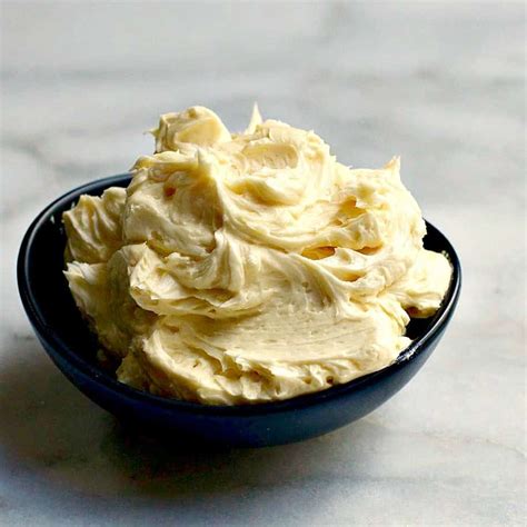 fluffy-vanilla-buttercream-frosting-pinch-and-swirl image