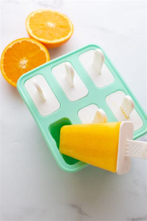 orange-popsicles-healthy-summer-treat-hint-of image