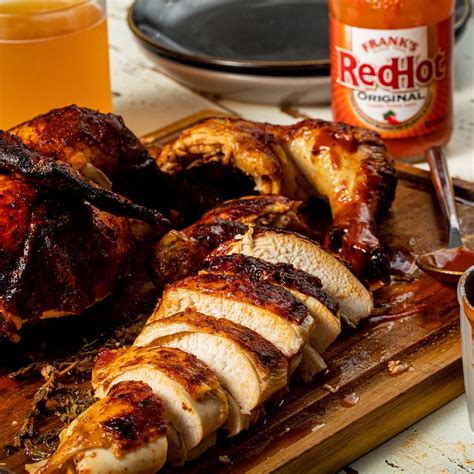 spicy-cajun-bbq-beer-can-chicken-recipe-franks image