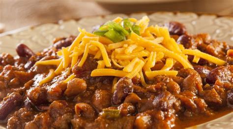 slow-cooker-hearty-bean-beef-sausage-chili image