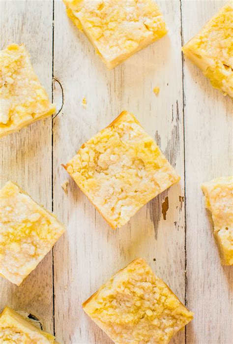 tropical-escape-pineapple-bars-with-crumble-topping image