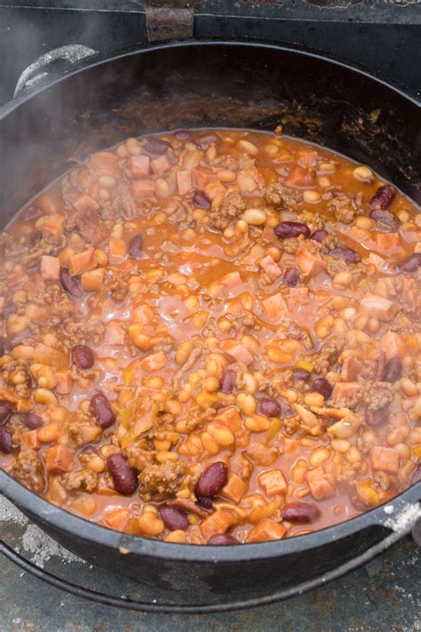 cowboy-beans-a-dutch-oven-full-of-baked-beans-devour image