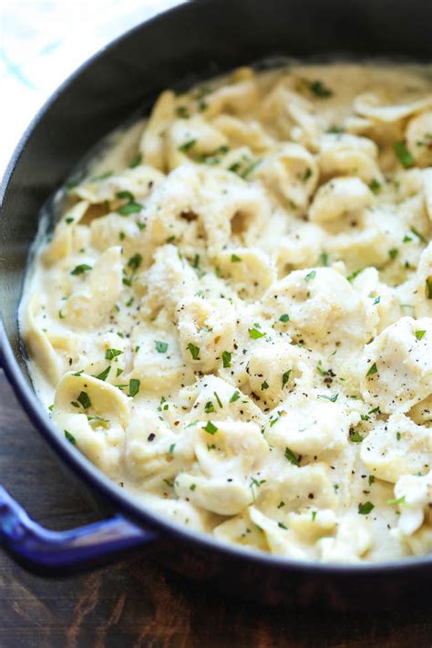 easy-garlic-alfredo-tortellini-damn-delicious image