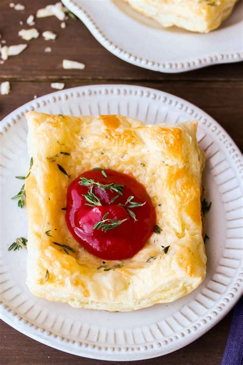 savory-gruyere-cheese-puffs-with-raspberry-sauce image