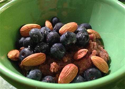 healthy-breakfast-teff-oatmeal-with-almonds-blueberries image