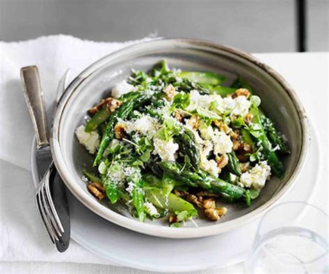 warm-asparagus-salad-with-walnuts-parmesan-lemon image