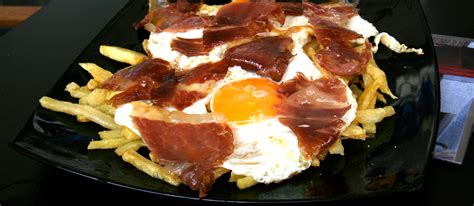huevos-rotos-traditional-egg-dish-from-madrid-spain image